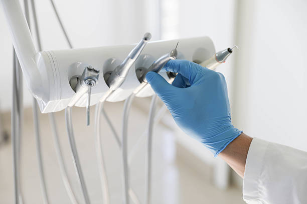 Professional Dental Crowns And Bridges technician working in Garden City Park, NY